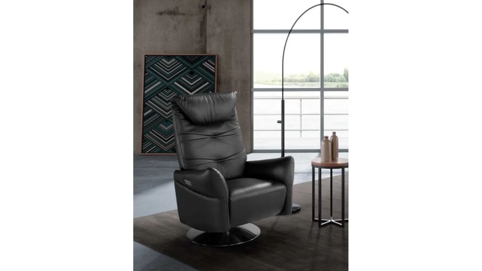 Poltrona relax in pelle con base in metallo Adrian Swivel di Spaziorelax